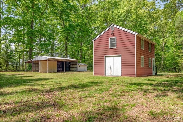 8000 N Courthouse Rd, New Kent, VA 23124 - view of pole building with a lawn
