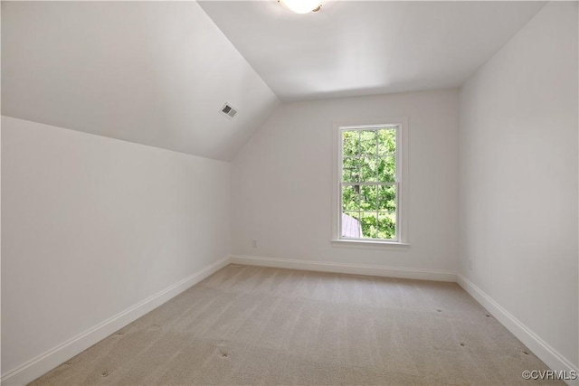 7208 Cornus Ave, Chesterfield, VA 23832 - additional living space featuring baseboards, lofted ceiling, visible vents, and light carpet