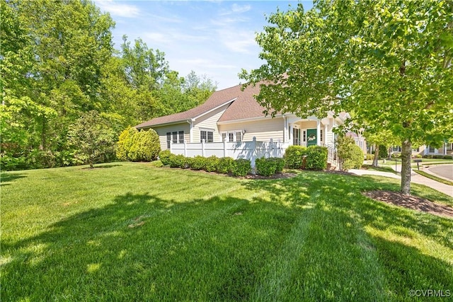 7208 Cornus Ave, Chesterfield, VA 23832 - back of house featuring a yard