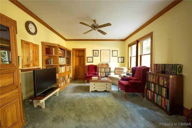 living area featuring a ceiling fan, carpet flooring, and ornamental molding