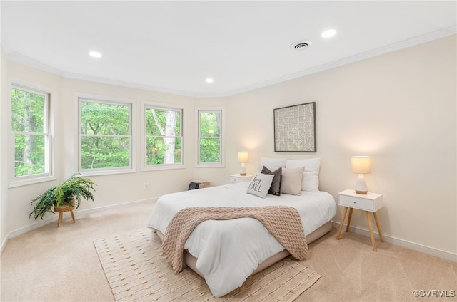 bedroom with light carpet, baseboards, ornamental molding, and recessed lighting