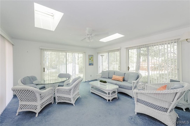 sunroom featuring a skylight