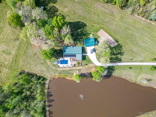 drone / aerial view featuring a water view and a rural view