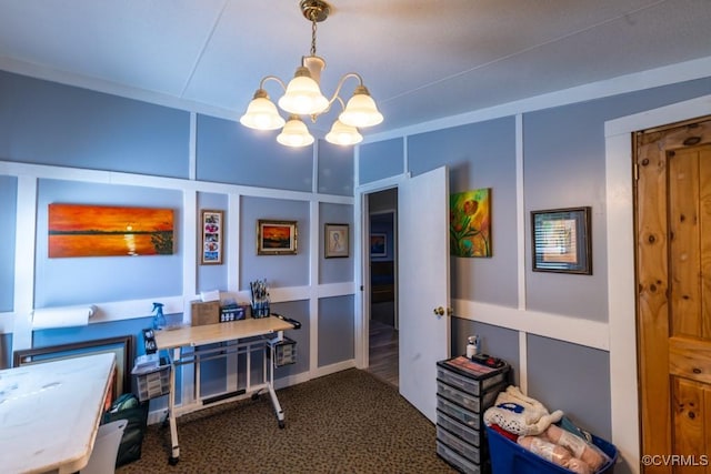office area featuring a notable chandelier and carpet