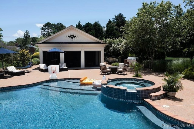view of pool with an outdoor structure, a patio area, a storage structure, and a pool with connected hot tub