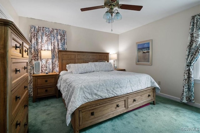 bedroom featuring light carpet, baseboards, and a ceiling fan