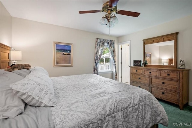 carpeted bedroom with a ceiling fan