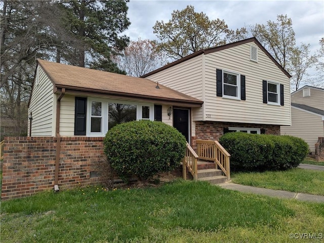 501 Faye St, Richmond, VA 23225 - tri-level home featuring brick siding