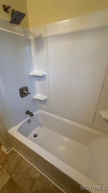 501 Faye St, Richmond, VA 23225 - full bathroom with tile patterned floors and shower / tub combination