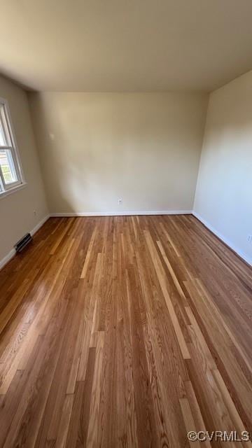 501 Faye St, Richmond, VA 23225 - spare room with baseboards and wood finished floors
