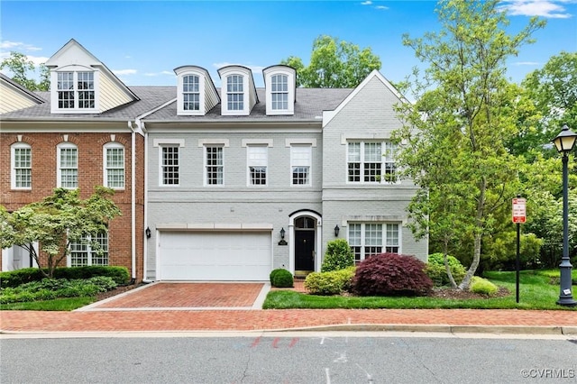 9522 Nassington Ct, Henrico, VA 23229 - view of front of property with a garage, brick siding, and driveway