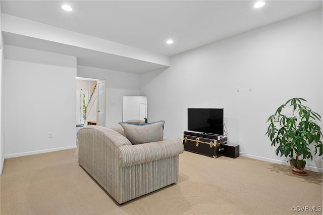 living area featuring carpet flooring, recessed lighting, and baseboards