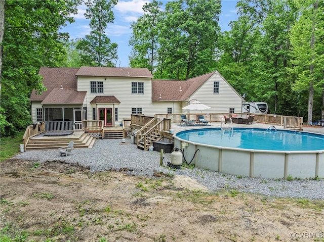 13032 Beech Creek Ln, Ashland, VA 23005 - swimming pool featuring a deck and a sunroom