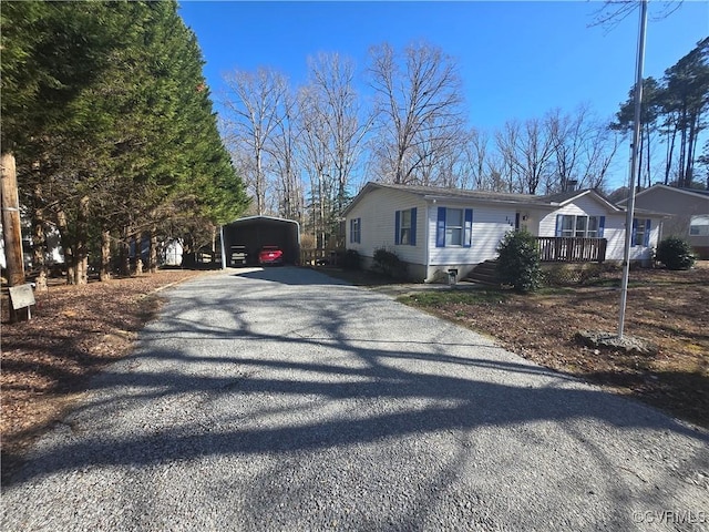116 Sycamore Ct, Bracey, VA 23919 - view of side of property with driveway and a detached carport