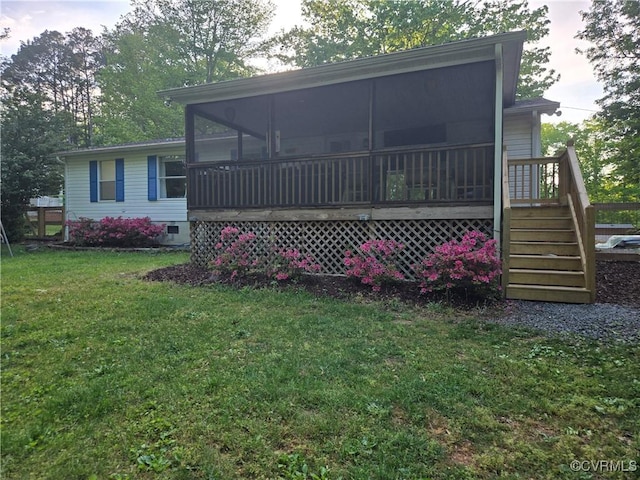 116 Sycamore Ct, Bracey, VA 23919 - rear view of property featuring a sunroom, stairs, and a lawn