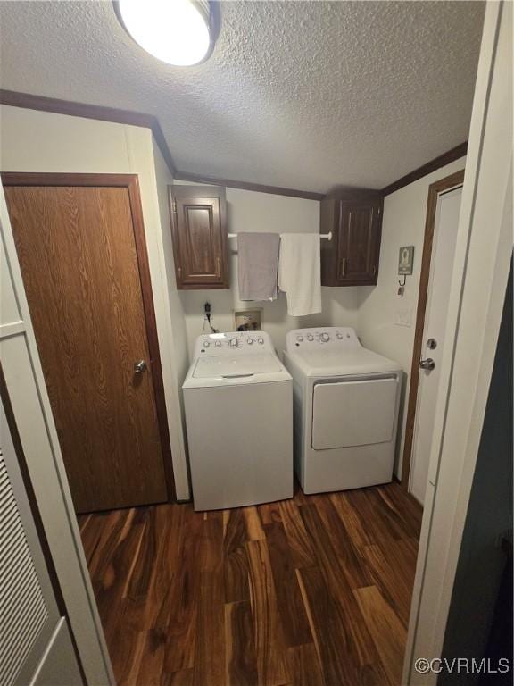 116 Sycamore Ct, Bracey, VA 23919 - laundry room featuring a textured ceiling, cabinet space, independent washer and dryer, and dark wood finished floors