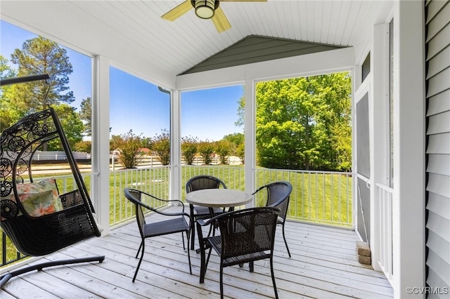 sunroom with a healthy amount of sunlight and a ceiling fan