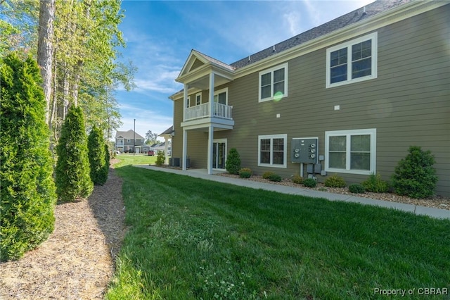7360 Sinclair Way, Gloucester, VA 23061 - rear view of house with a yard and a balcony