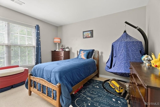 bedroom featuring visible vents and carpet flooring