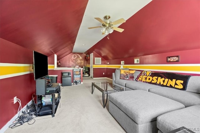 living area featuring lofted ceiling, carpet flooring, ceiling fan, visible vents, and baseboards