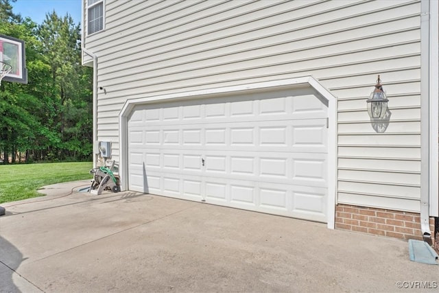 garage featuring driveway