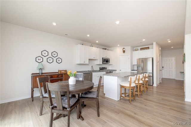 11513 Dunmore Mill Ter Unit 3-4, Chester, VA 23831 - dining area featuring recessed lighting, baseboards, and light wood finished floors