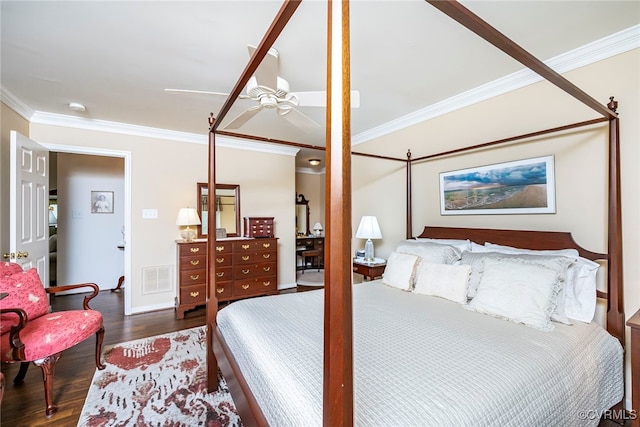 bedroom featuring ornamental molding, wood finished floors, baseboards, and a ceiling fan