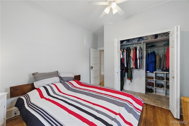 bedroom featuring light wood finished floors, a closet, a ceiling fan, and vaulted ceiling