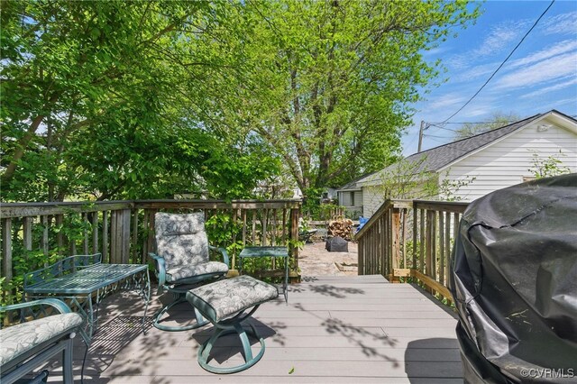 wooden terrace with grilling area