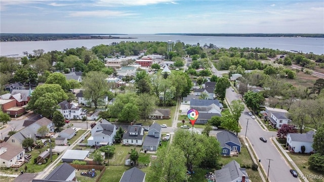 bird's eye view with a water view and a residential view