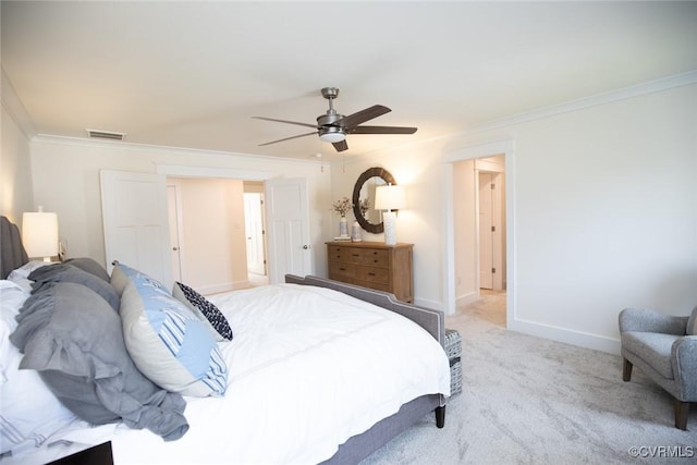 bedroom with baseboards, visible vents, ornamental molding, and carpet flooring