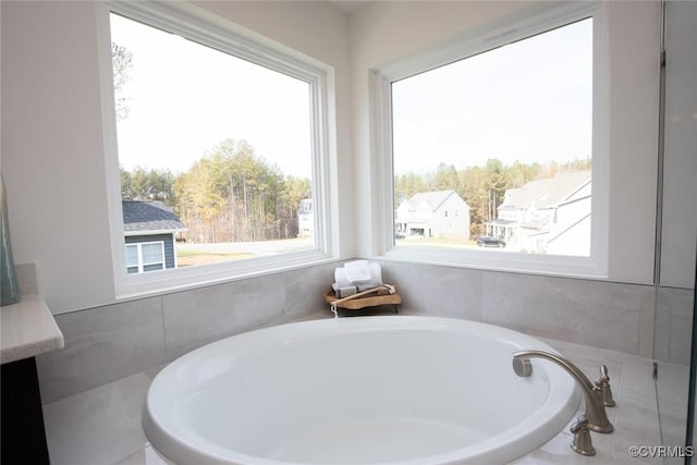 bathroom with a washtub