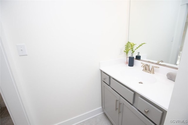 bathroom featuring vanity and baseboards