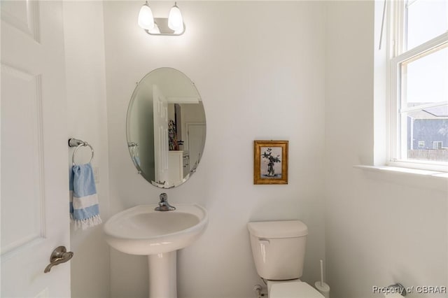 half bathroom with toilet