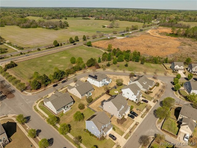 drone / aerial view with a rural view and a residential view