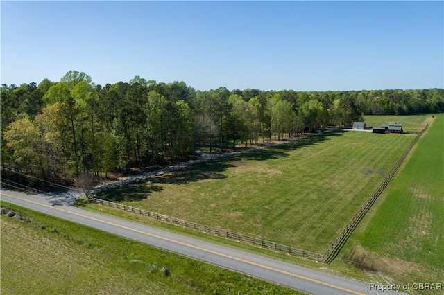 birds eye view of property featuring a rural view
