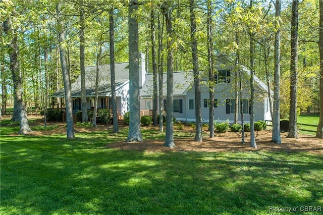 view of front of home with a front yard