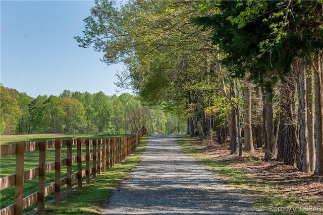 view of road with a view of trees