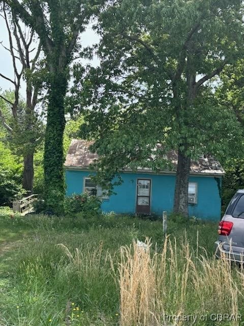 exterior space with stucco siding