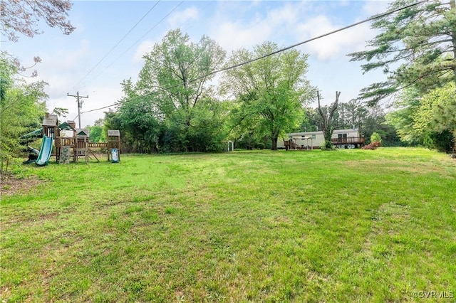 view of yard with a playground