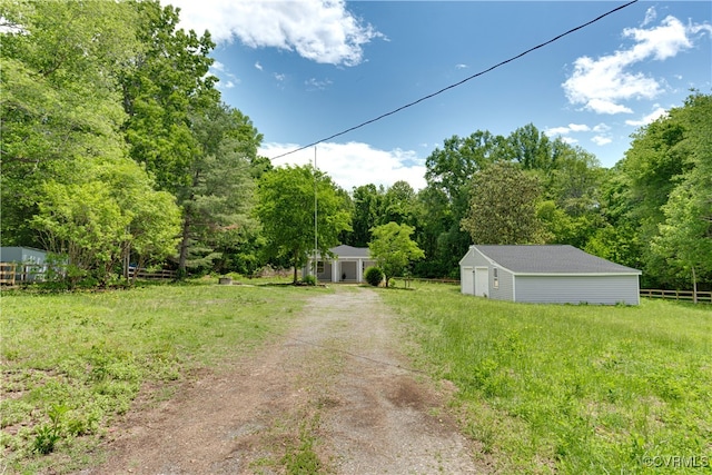 17072 Gun Barrel Rd, Montpelier, VA 23192 - view of yard with an outbuilding, fence, and a forest view