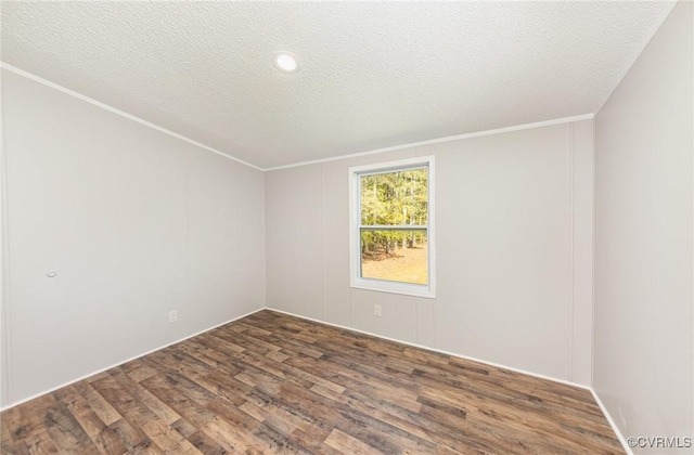 1223 Ullainee Rd, Essex, VA 22436 - unfurnished room with wood finished floors, a textured ceiling, and ornamental molding