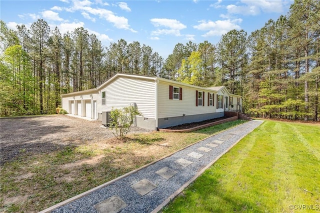 1223 Ullainee Rd, Essex, VA 22436 - view of side of home featuring a yard and crawl space