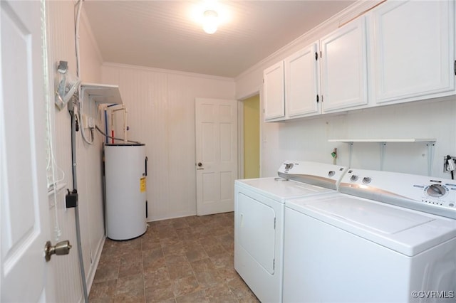 laundry area featuring water heater, ornamental molding, washing machine and dryer, and cabinet space