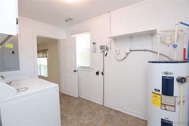 washroom featuring laundry area, ornamental molding, a wealth of natural light, and electric water heater