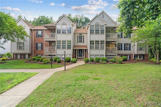 3218 Matilda Cv Unit 104, Henrico, VA 23294 - view of front of property with a front yard and brick siding
