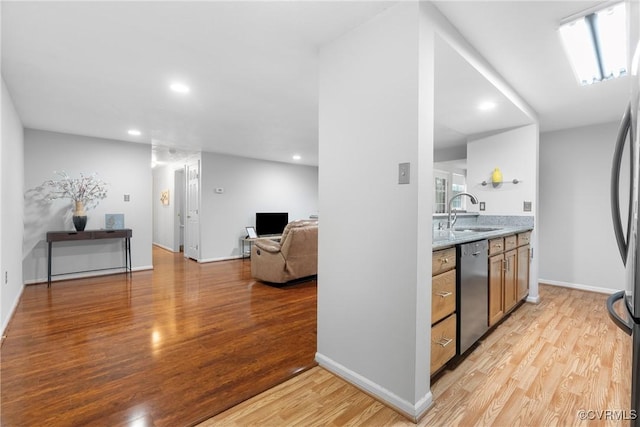 3218 Matilda Cv Unit 104, Henrico, VA 23294 - kitchen with stainless steel dishwasher, light wood-type flooring, a sink, recessed lighting, and open floor plan