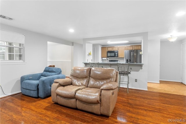 3218 Matilda Cv Unit 104, Henrico, VA 23294 - living room featuring wood finished floors and recessed lighting