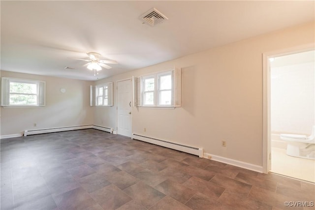 7704 Quail Hollow Rd, Mc Kenney, VA 23872 - spare room featuring a wealth of natural light, visible vents, baseboard heating, and a baseboard heating unit