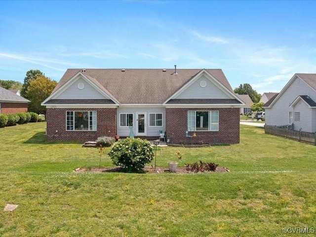 225 Lighthouse Pointe, North Prince George, VA 23860 - back of property with a lawn, brick siding, and fence